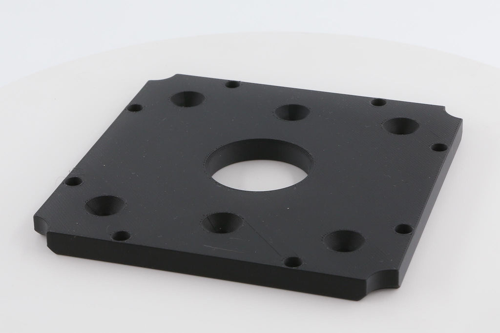 a2z Coin Chuck Jig with three-jaw chuck holding brass coin